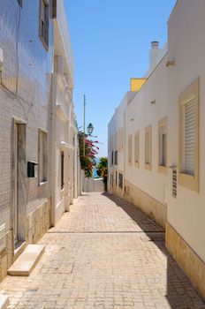 Picuresque narrow street in Albufeira, Algarve, Portugal