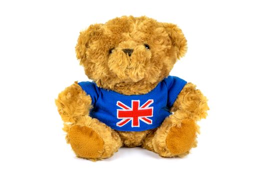 Teddy bear with UK flag isolated on white background