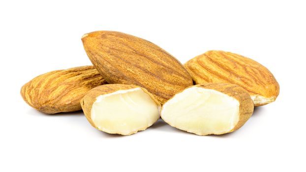 Almond nuts isolated on white background with clipping path