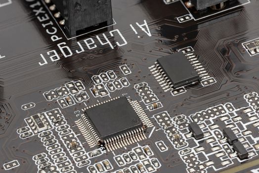 Closeup of electronic circuit board as technological background