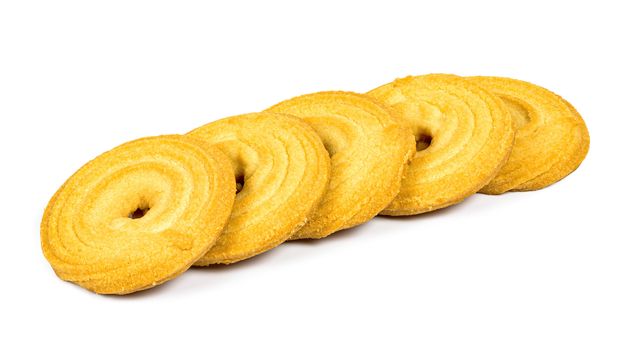 Butter cookies in a row isolated on white background with clipping path