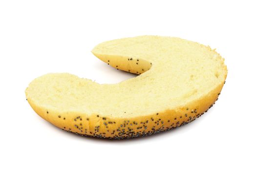 Half of crescent roll with poppy seed isolated on white background with clipping path