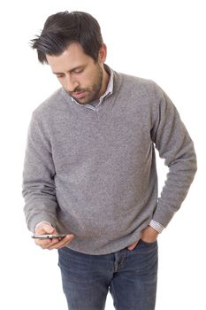 young casual man with a phone, isolated