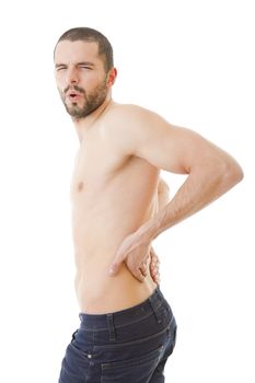 rear view of a young man holding his back in pain, isolated on white background