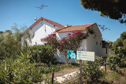 ilha de tavira, portugal - may 3, 2018: architectural detail of a typical small island house on a spring day