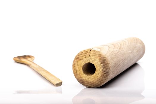 wooden spoon and rolling pin on white background in studio