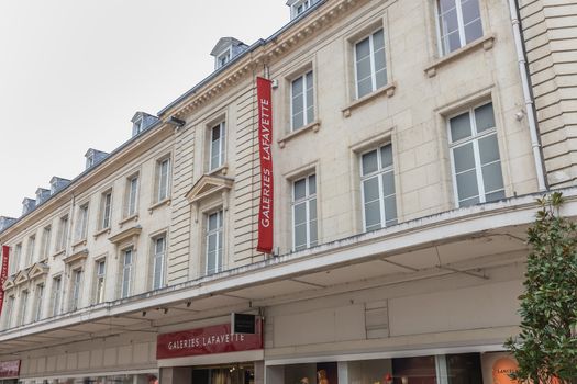 Tours, France - February 8, 2020: View of the facade of the luxury store Galeries Lafayette in the historic city center on a winter day