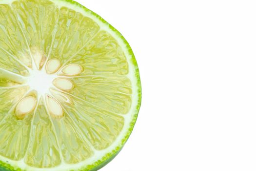 Close up green lemons with half  isolated on white background