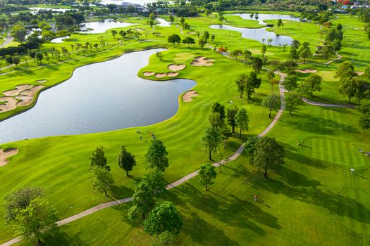 Aerial view of golf field landscape with sunrise view in the morning shot. Bangkok Thailand