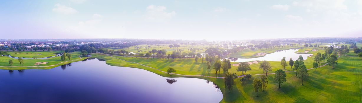 Aerial view of golf field landscape with sunrise view in the morning shot. Bangkok Thailand