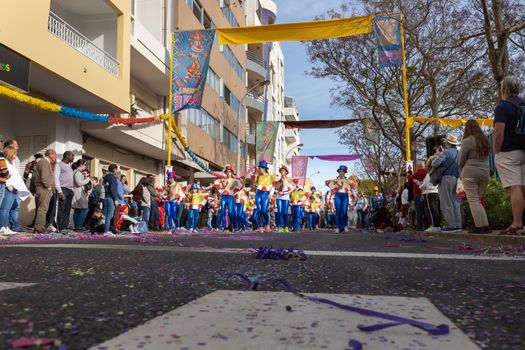 Loule, Portugal - February 25, 2020: dancers parading in the street in front of the public in the parade of the traditional carnival of Loule city on a February day