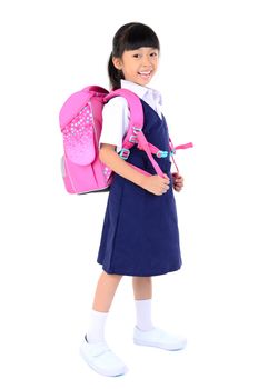 Portrait of Asian child in school uniform with school bag on white background isolated.