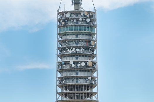 Barcelona, Spain - June 21, 2017: View of the Collserola telecommunications tower on the heights of Barcelona on a summer day