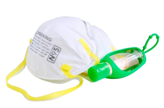 N95 respirator  with alcohol sanitizer gel on grey background for covid-19 Coronavirus prevention concept.