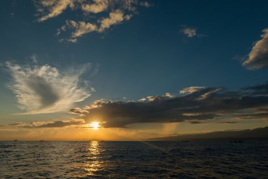 Sun rising ove Pacific ocean - view from the boat