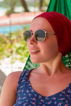 Young woman relaxes at the beach of Bai Sao, Phu Quoc Vietnam