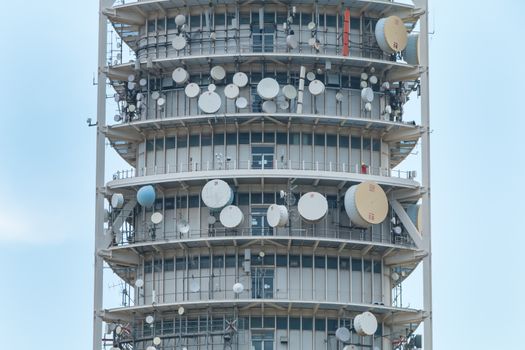 Barcelona, Spain - June 21, 2017: View of the Collserola telecommunications tower on the heights of Barcelona on a summer day