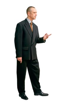 An handsome man in black suit, indicating something with the finger, on white background