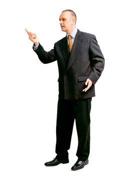 An handsome man in black suit, indicating something with the finger, on white background