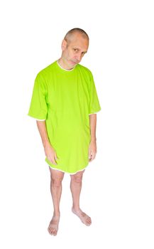 A depressed man in green nightdress, on white background