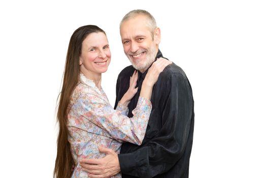 Happy mature man and woman with long hair smiling for S. Valentine's day or anniversary. Isolated on white background.