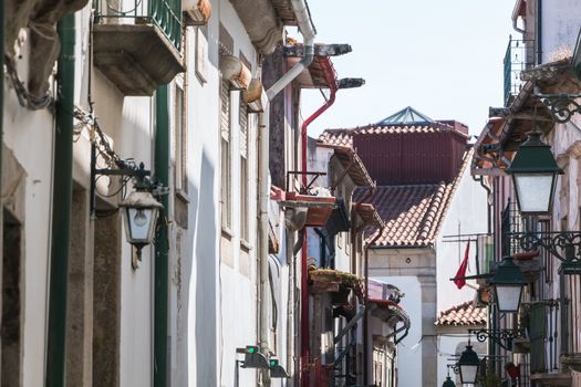 Viana Do Castelo, Portugal, Portugal - May 10, 2018: Architecture detail of typical houses and shops in the streets of the historic city center that tourists visit on a spring day