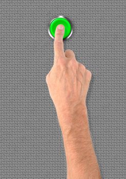 A man pushing a big green start stop alarm button with the finger