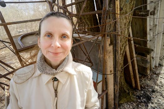 Smiling sweet and benevolent adult woman outdoor during a nice spring day