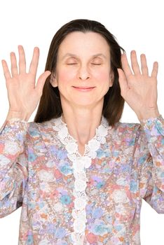 Smiling woman with closed eyes and open hands up showing the palms close to the face to express a lack of interest