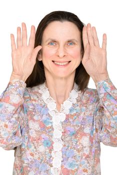 Smiling woman with open blue eyes and open hands up showing the palms close to the face