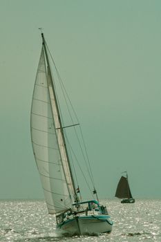 Sailing boat in the sunlight