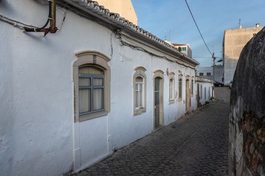 Loule, Faro, Portugal - February 25, 2020: architectural detail of pretty little typical house in the city center on a winter day