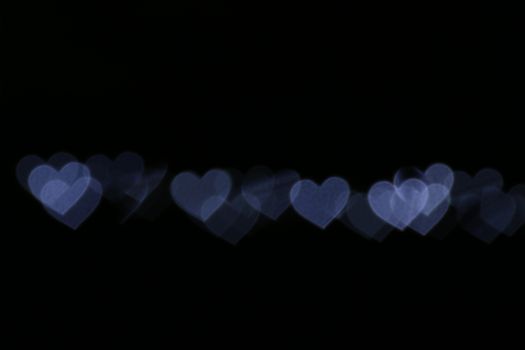 bokeh heart-shaped on black background, lighting bokeh for wallpaper, blurred bokeh for valentine's day background, love pictures background, lighting heart shape soft at night time