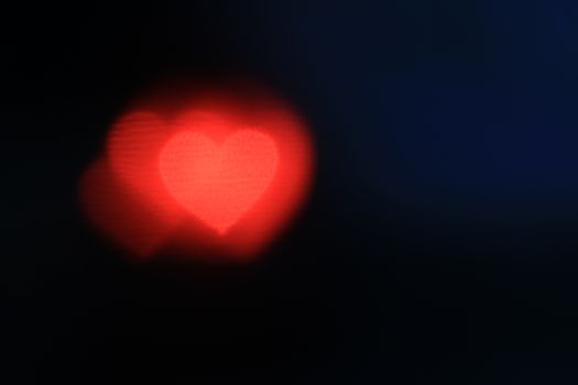 red heart-shaped on black background, lighting bokeh for wallpaper, blurred bokeh for valentine's day background, love pictures background, lighting heart shape soft at night time