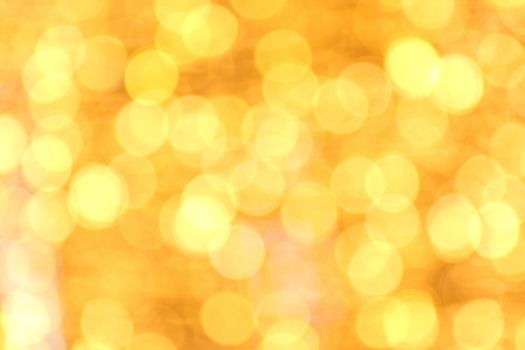 Bokeh background gold yellow colorful of merry christmas, Happy new year bokeh lighting shine on night background, Bokeh glitter light, Gold Luxury backdrop texture, Glittering wallpaper