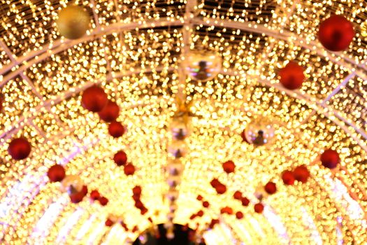 Arch Bokeh gold yellow colorful of merry christmas, Happy new year bokeh lighting shine on night background, Bokeh glitter light, Gold Luxury backdrop texture, Glittering wallpaper