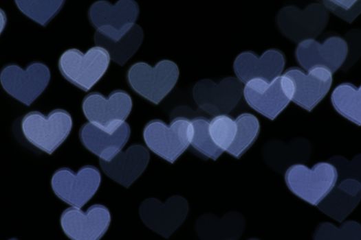 Colorful heart-shaped on black background lighting bokeh for decoration at night backdrop wallpaper blurred valentine, Love Pictures background, Lighting heart shaped soft at night abstract