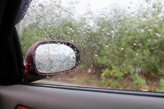 Water Raindrop Fresh on windshield,Feeling relax or lonely in a car, Cleaning Glass Automotive