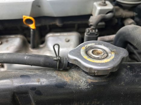 radiator cap, old radiator of car, car radiator iron dirty, radiator steel of car close up