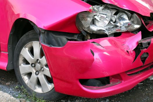 pink car accident damaged to headlights front, broken headlights car crash accident, damaged automobiles after collision of pink car accident