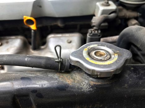 radiator cap, old radiator of car, car radiator iron dirty, radiator steel of car close up