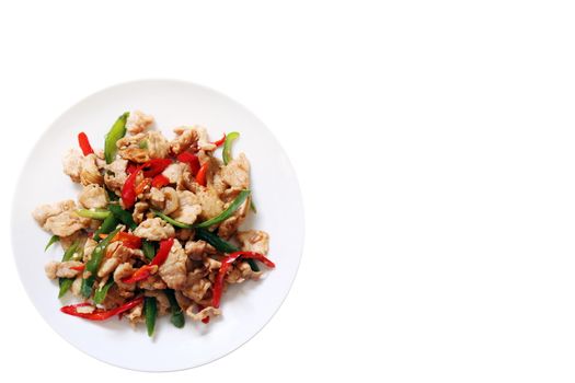 spicy food, chili food, Fried sweet pepper with pork, Fried chili paste with pork, meat, Salted pork with chili cooking oil & Basil leaves on top white dish thai food on white background