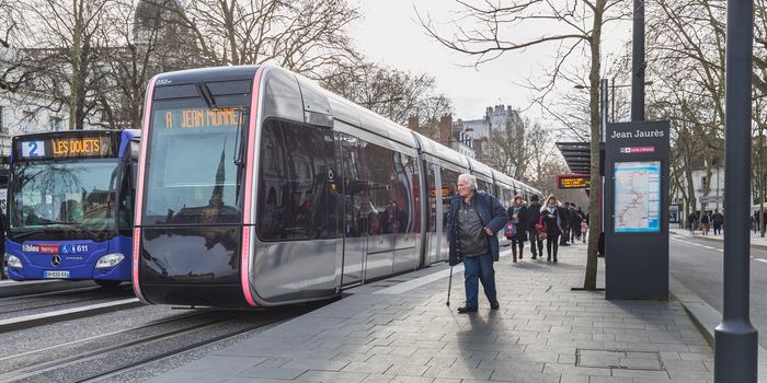 Tours, France - February 8, 2020: travelers in the Jean Jaures electric tram and bus station near the town hall on a winter day