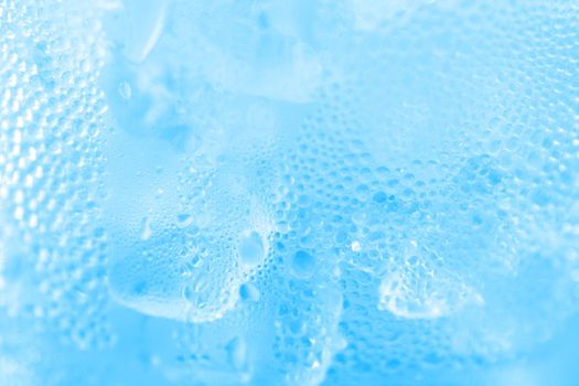 water drop soda ice baking background fresh cool ice blue texture, selective focus