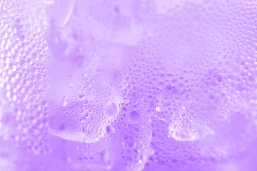 water drop soda ice baking background fresh cool ice purple texture, selective focus