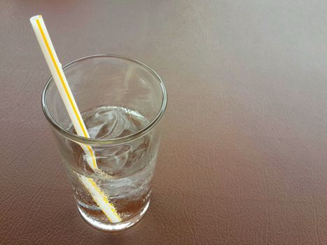 Glass of ice on table, Water clear glass and cold