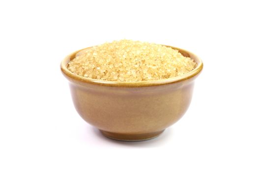 sugar, granulated sugar in ceramic cup brown on white background, granulated sugar for ingredient sweet food