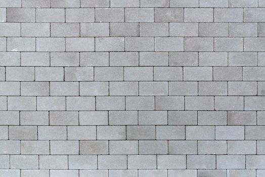 Gray sett bricks - texture or background, pavement.