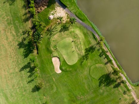 Aerial top view photo from flying drone of Golf Course, Lush green grass on golf course