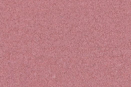 Seamless detailed background or texture made of red colored asphalt